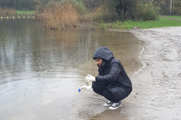 Collecting lake water samples